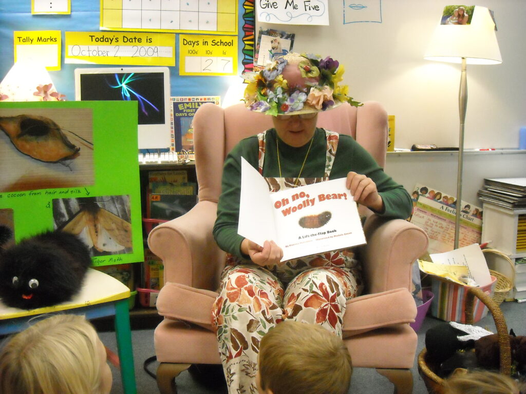 Miss grian reading to a kindergarten class